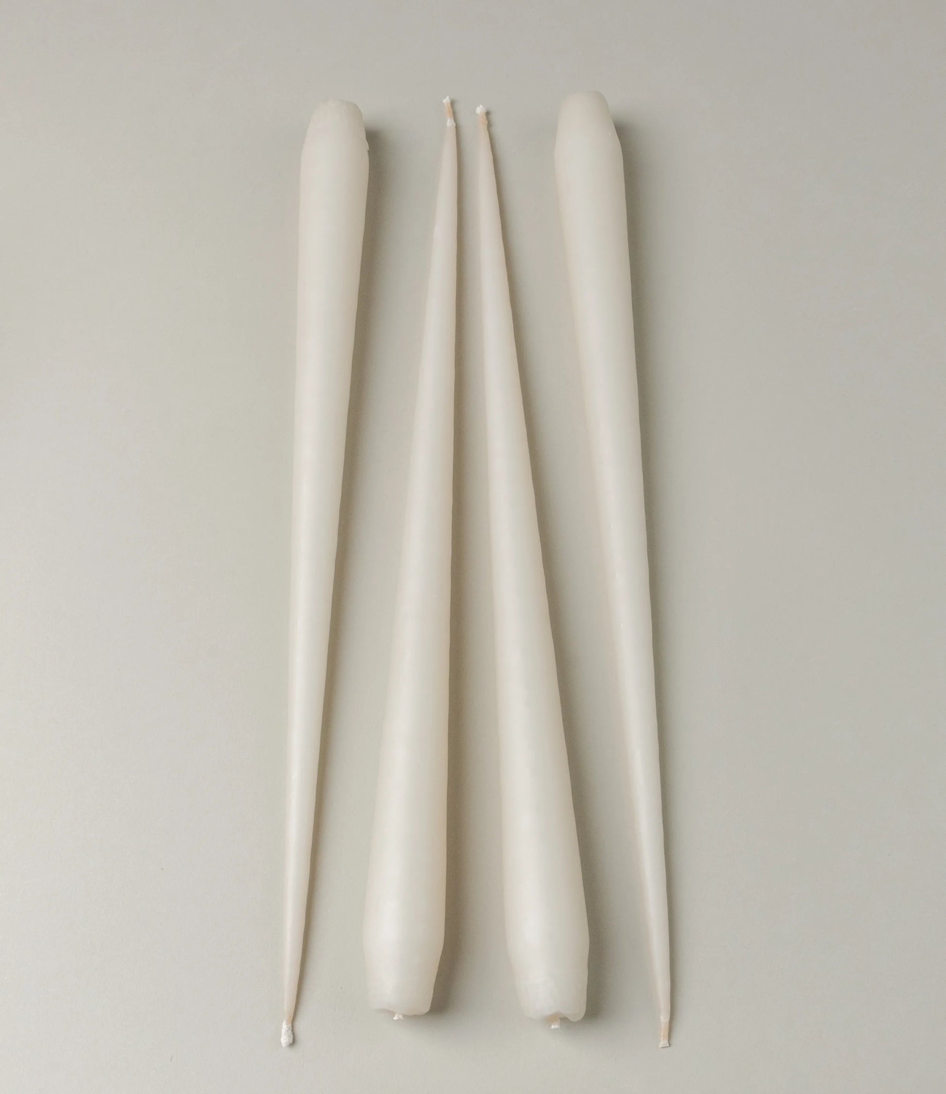 Ester&Erik Taper Candle coming in an ivory shade. The package contains 4 taper candles of the same shade.