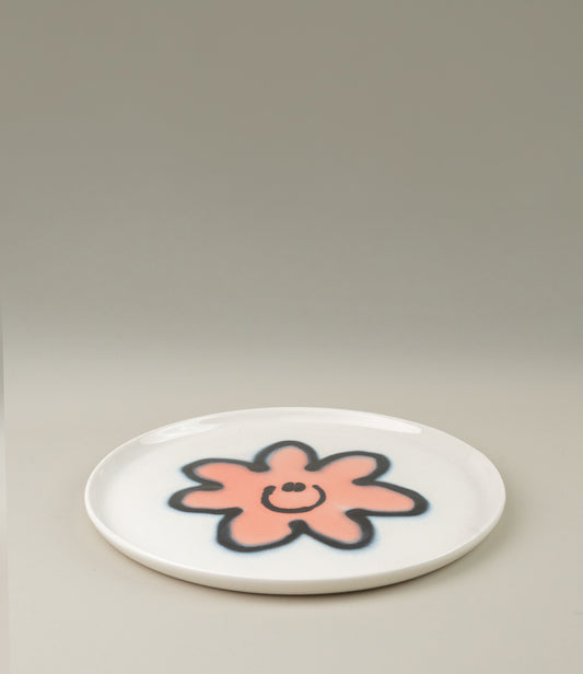 Frizbee Ceramics' Plate coming with the Peach Carne pattern on a white base.