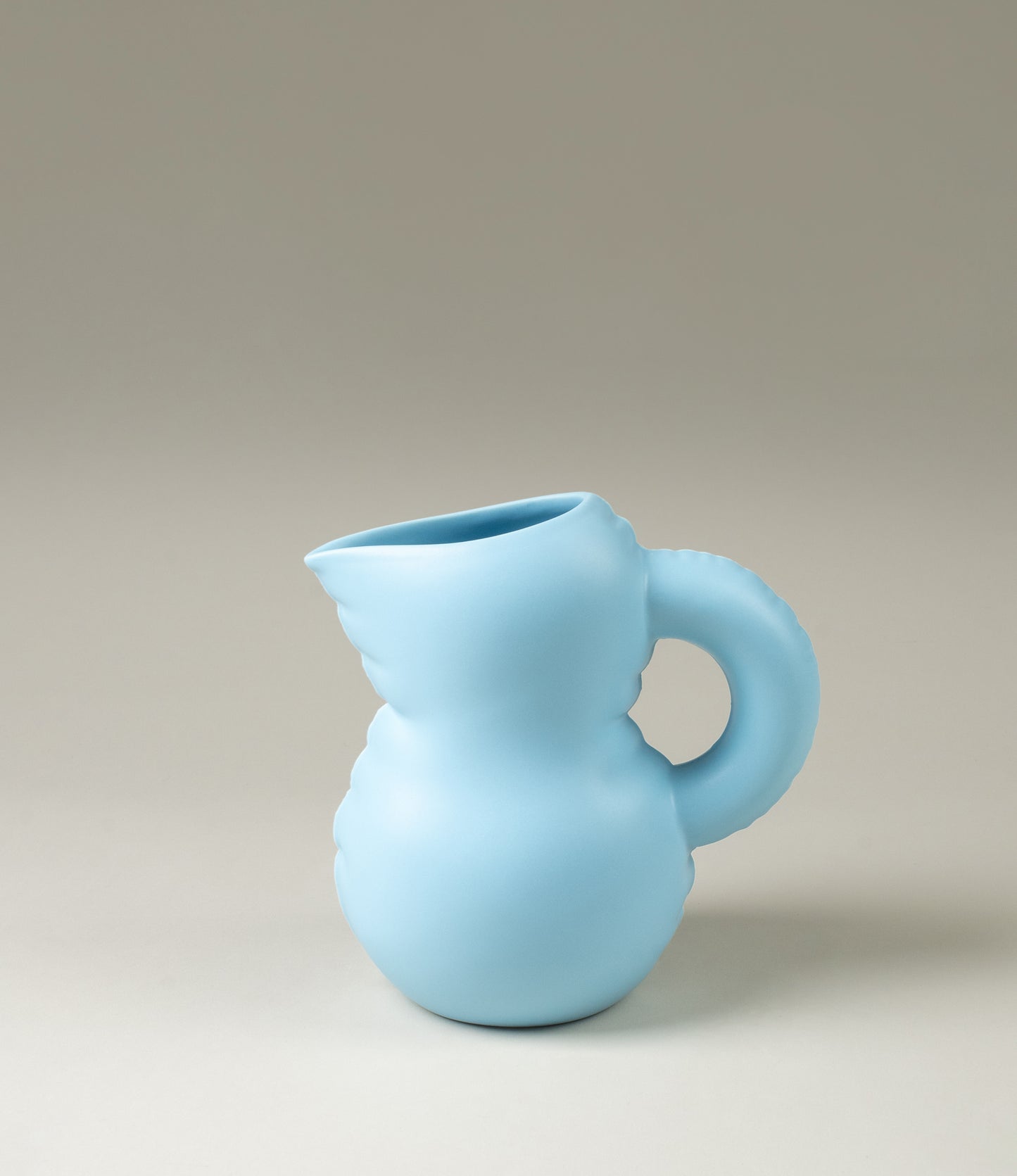 Jug called 'Emily' from Home Studyo comes in the soothing sky blue color. The product looks like an inflated balloon but was made from ceramic.