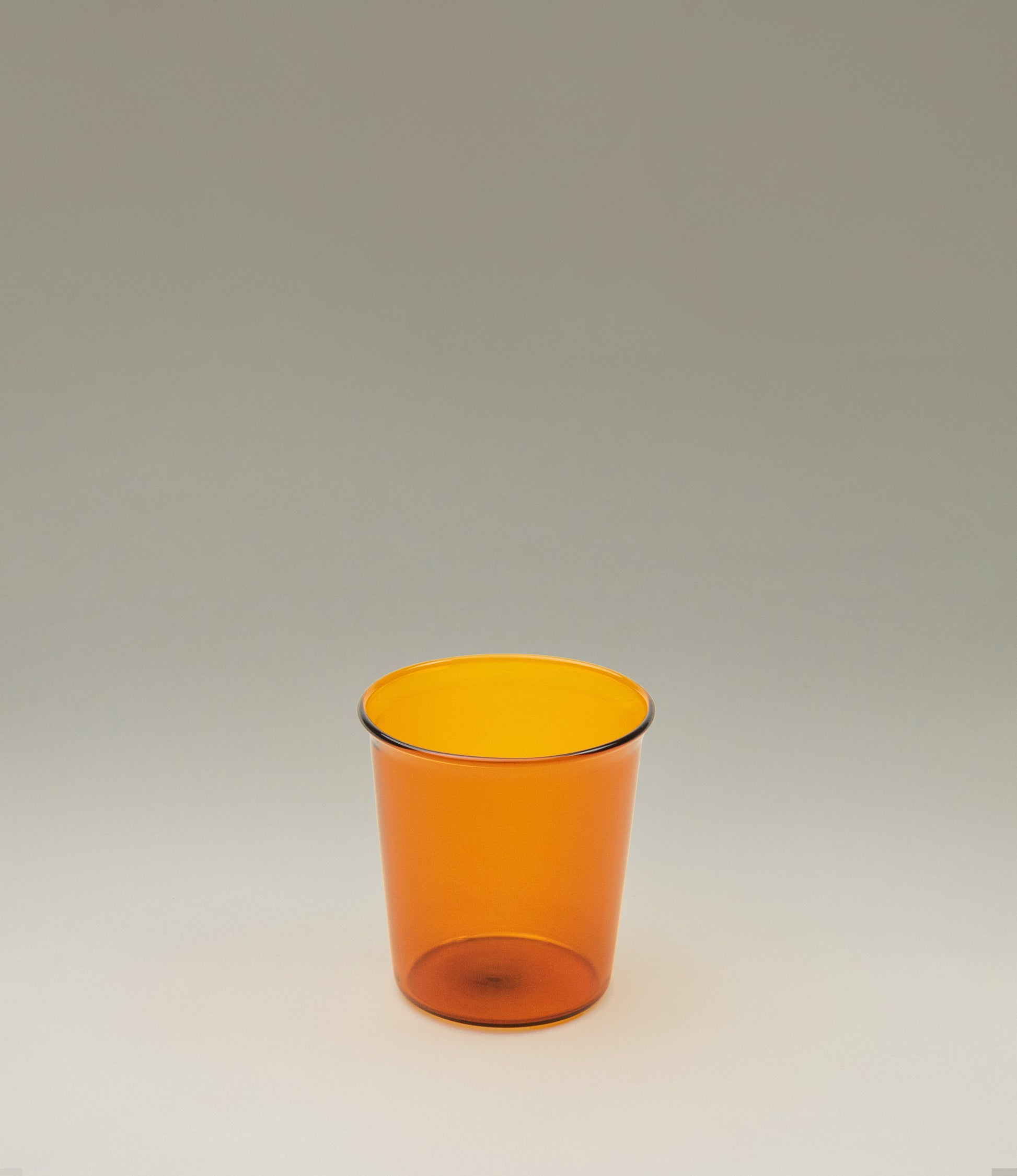 Cast Amber Glass from Kinto. The tip of the glass turns slightly outwards which makes drinking even more comfortable.