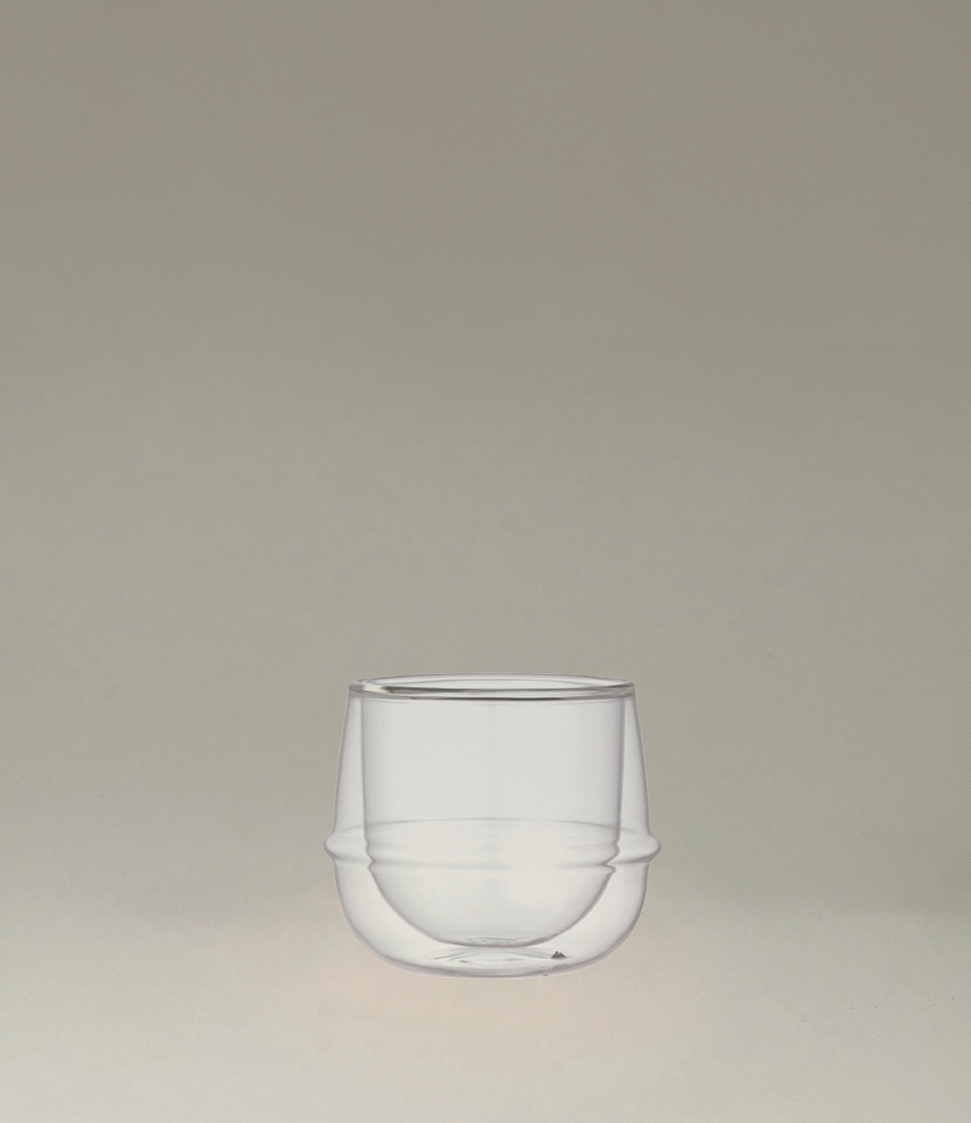 Kronos Wine Glass from the Japanese brand called Kinto. The glass is double walled and perfectly clear. The glass can hold 250ml of liquid.