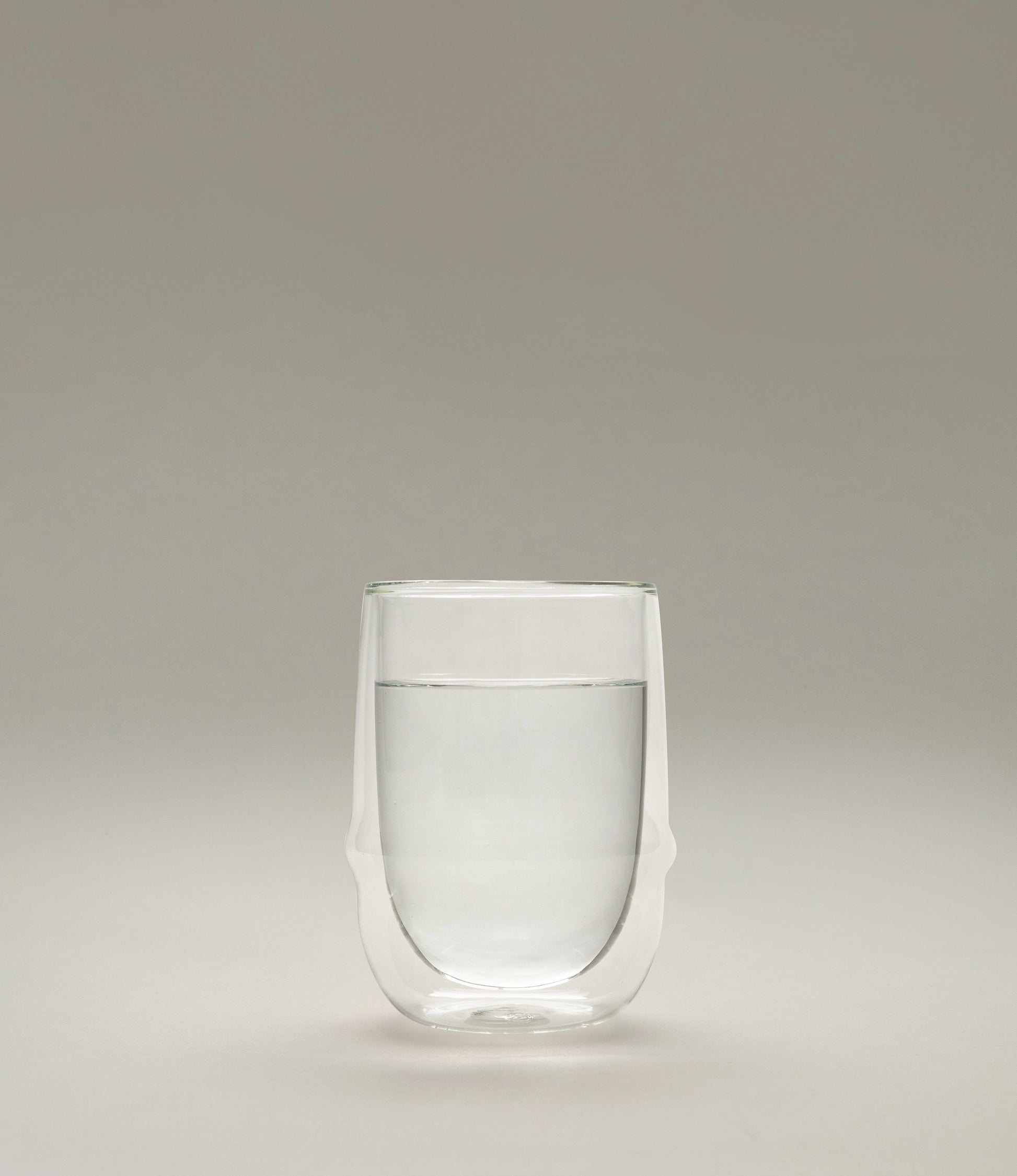 Kronos Iced Tea Glass from the Japanese brand called Kinto. The glass is double walled and perfectly clear. The glass can hold 350ml of liquid.