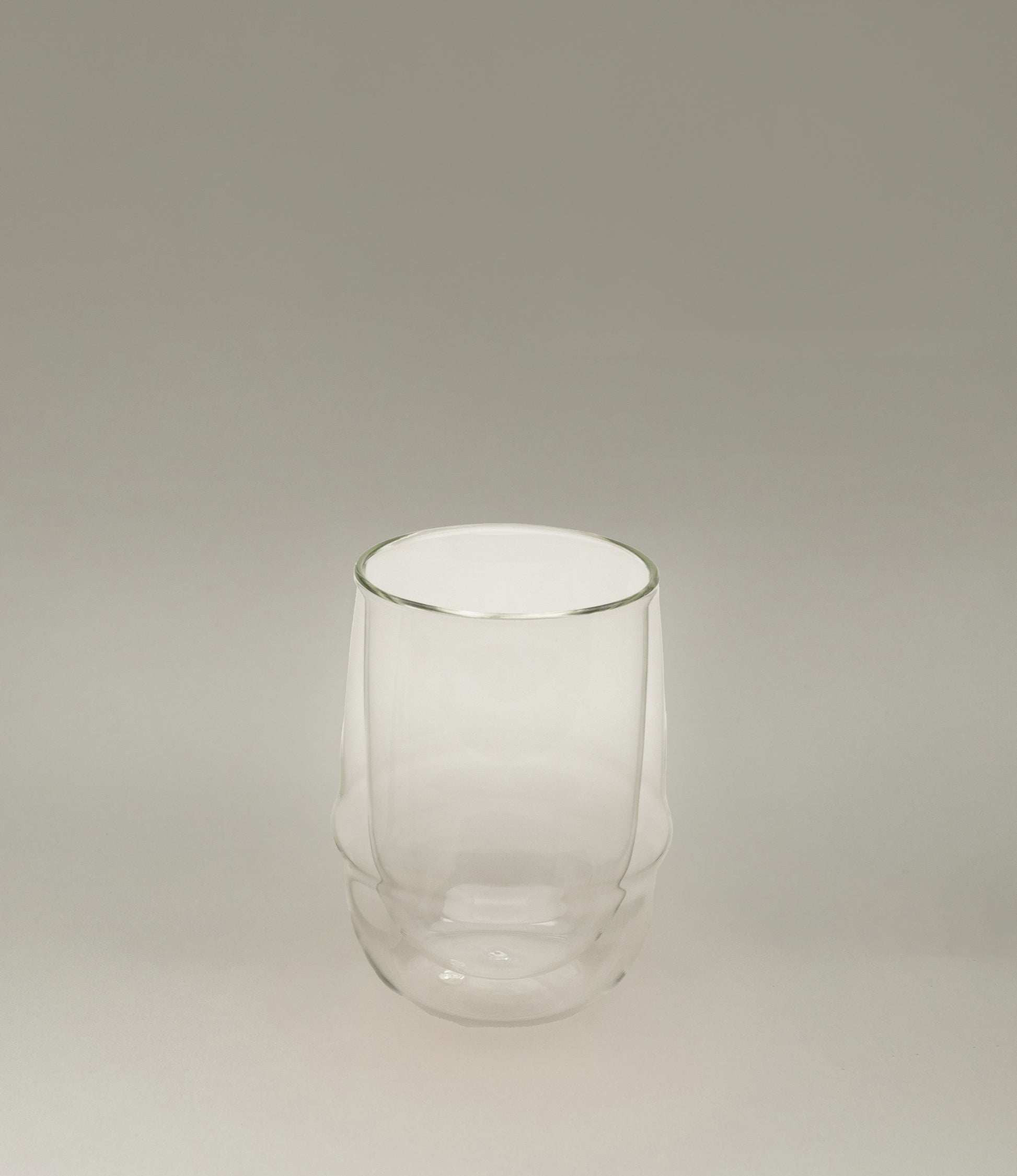 Kronos Iced Tea Glass from the Japanese brand called Kinto. The glass is double walled and perfectly clear. The glass can hold 350ml of liquid.