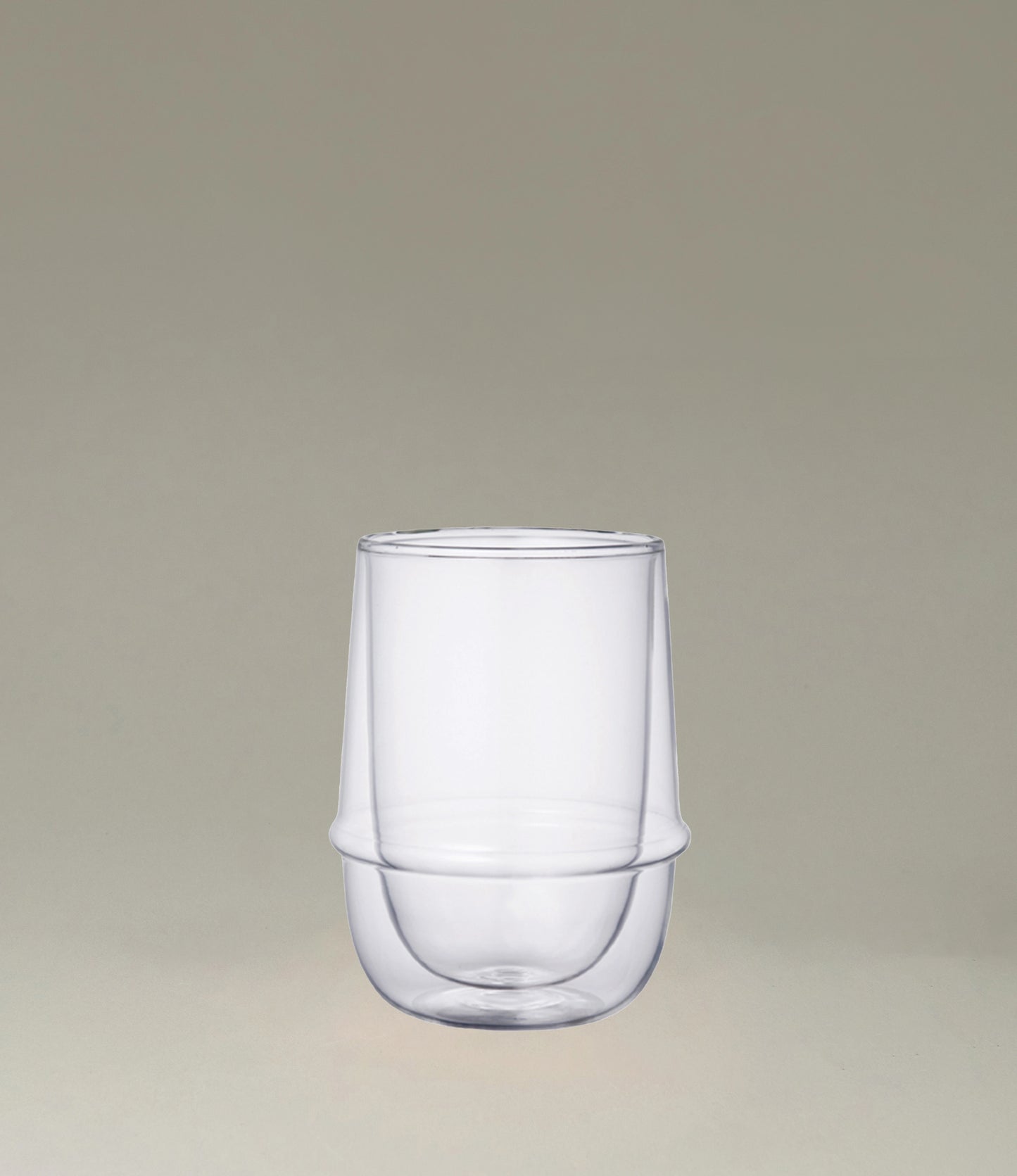 Kronos Iced Tea Glass from the Japanese brand called Kinto. The glass is double walled and perfectly clear. The glass can hold 350ml of liquid.