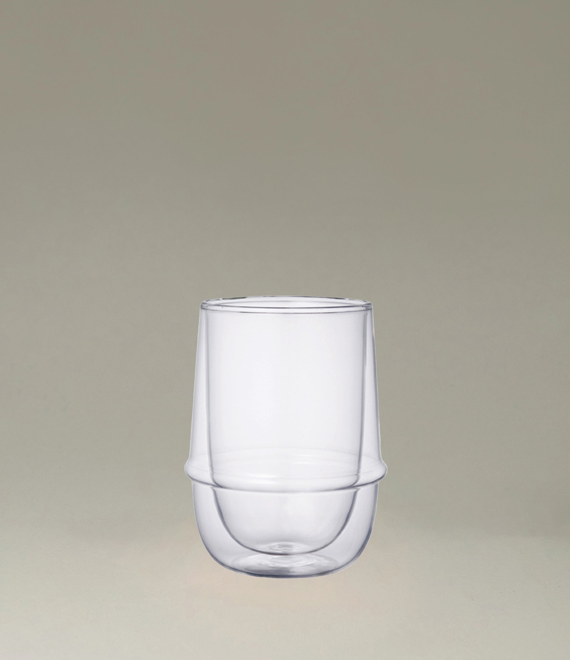 Kronos Iced Tea Glass from the Japanese brand called Kinto. The glass is double walled and perfectly clear. The glass can hold 350ml of liquid.