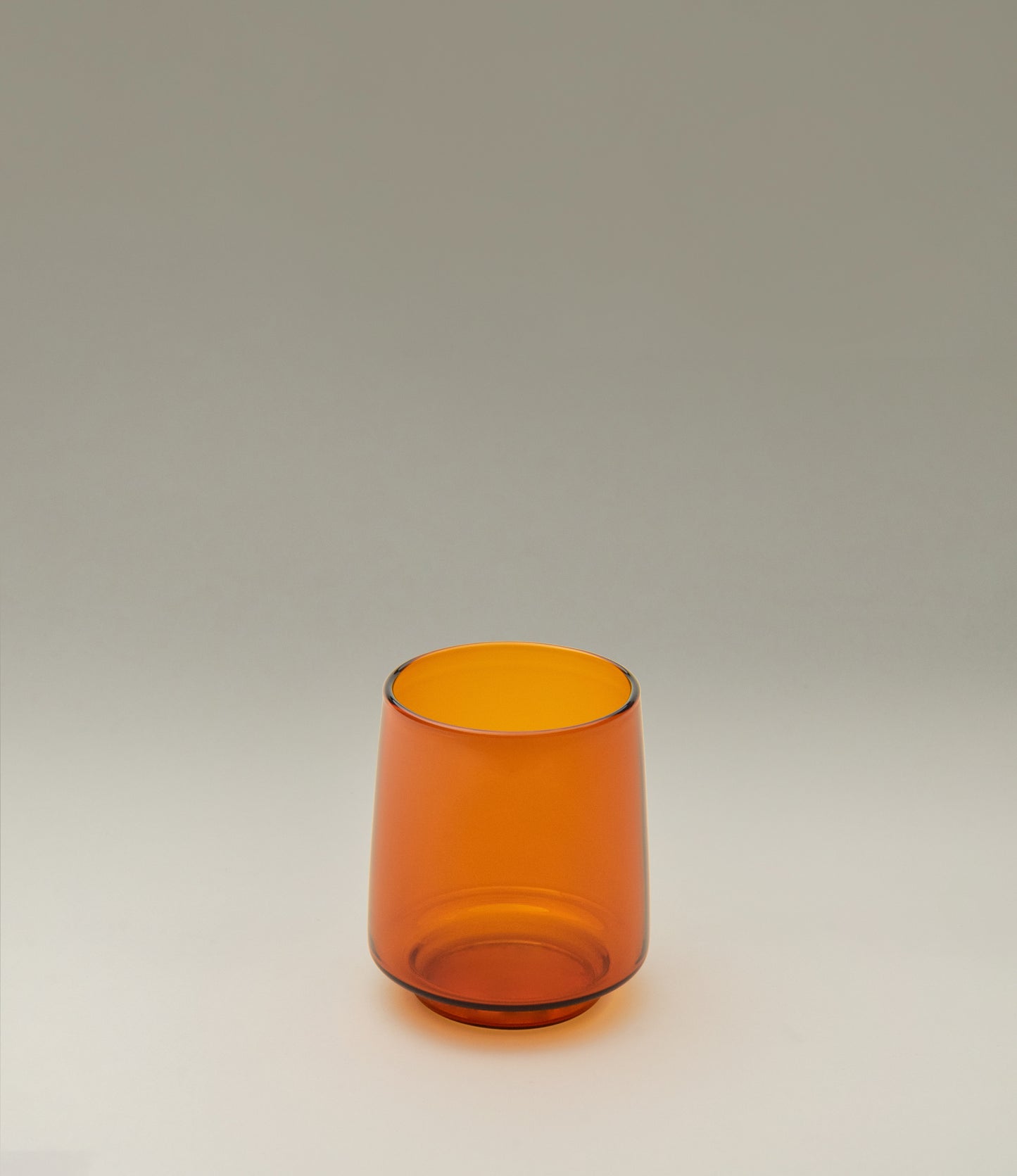 Sepia Tumbler is a glass item from the japanese brand Kinto. The product was made to hold your favorite beverages up to 370 ml. The item has the nostalgic amber color.