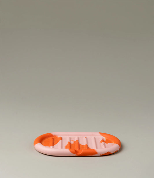 Soap Holder from Gritful Homeware in the maximalist color pairing of light rose and orange. The soap dish has a rounded shape which matches the pattern of the item, which is very much organic. 